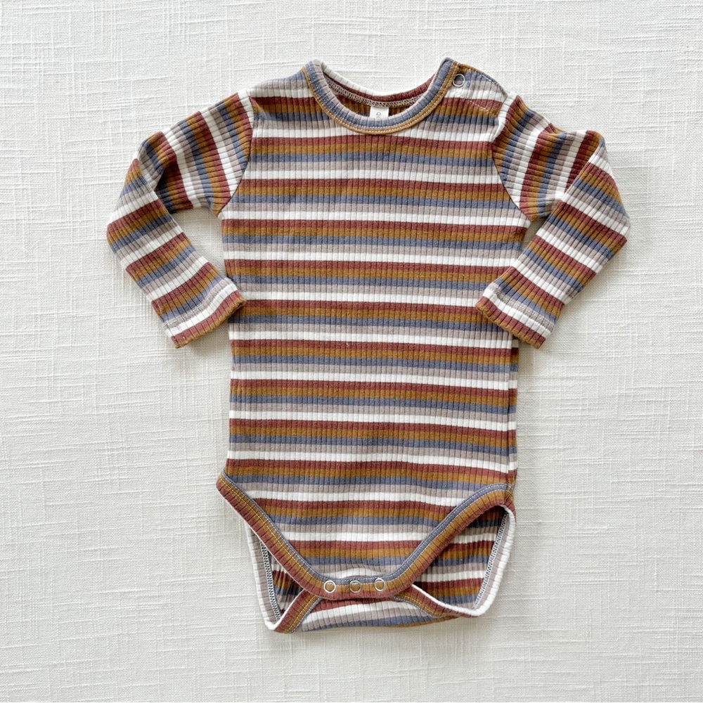 Quincy Mae baby boy long sleeve onesie in rust brown and blue stripes.